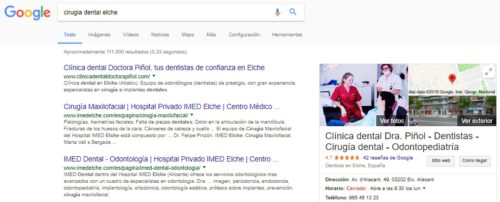 Resultados en Google para la búsqueda "cirugia dental elche", con la clínica dental dra. Piñol en primera posición